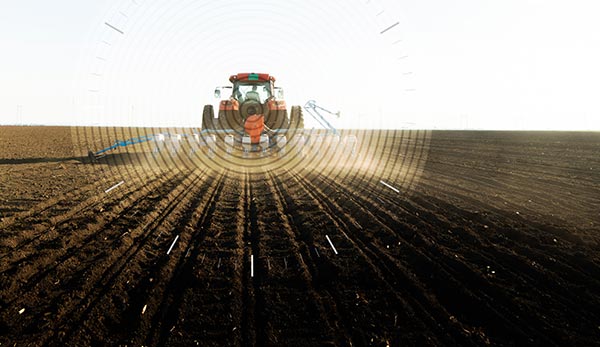 Planter in a field with a graphic overlay